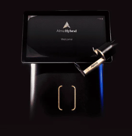 Alma Hybrid laser system with its welcome screen and handpiece